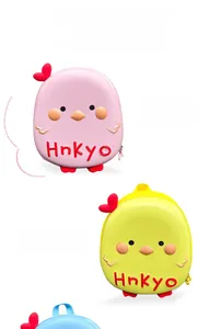 Detailed view of colorful 3D cartoon chick hard shell backpacks for kids in various colors