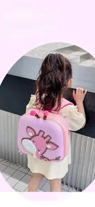 Pink cartoon deer backpack for toddlers featuring breathable mesh padded shoulder straps