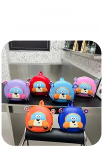 Detailed close-up showing six colorful hardshell cartoon car backpacks for kids