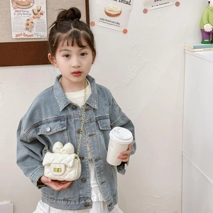 White quilted mini cross-body bag for girls with large bow and gold chain strap
