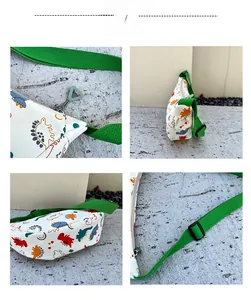 Detail view of floral dinosaur nylon kids chest bag with adjustable green strap