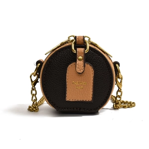 Retro color-block mini round crossbody bag for kids with bronze chain strap and leather texture