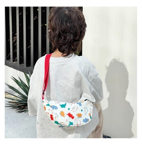 Rear view of kid wearing white chest bag with colorful cartoon dinosaur prints