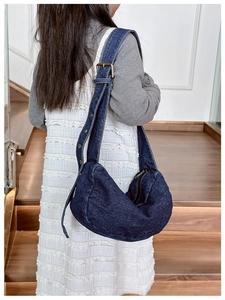 Kids' retro denim crescent crossbody bag with adjustable wide shoulder strap detail