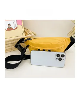 Detailed view of yellow sports waist bag with smartphone for size comparison guide