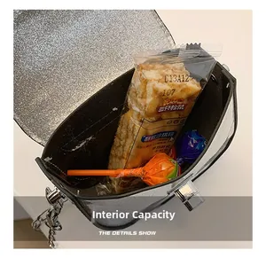 Macro view showing the internal capacity and black lining of the silver glitter kids bag