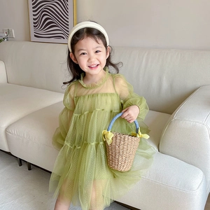 Girl's green layered tulle dress with gold glitter and ruffle details for summer wear