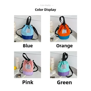 Detail showing the four color options of this kids bucket bag with adjustable straps