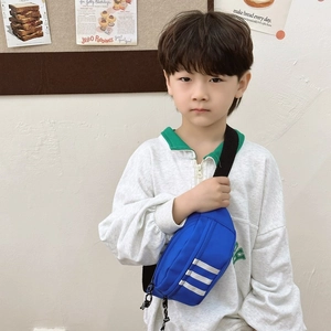 Blue kids crossbody chest bag with white sports stripes and adjustable strap