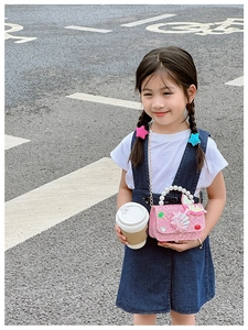 Pink sequin crossbody bag for girls with pearl handle and fish tail theme details