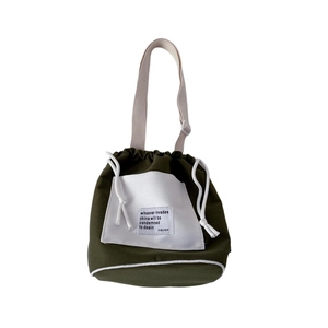 Minimalist canvas bucket bag for kids with drawstring closure in olive green and white
