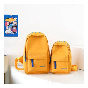 Front view of yellow nylon chest bags in two sizes with blue Fashion text and straps