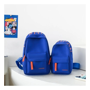 Blue mini chest bags in two sizes featuring orange Fashion letters for kids