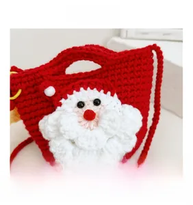 Close-up of handmade crochet Christmas Santa shoulder bag showing detailed knit texture