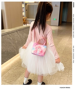 Detail of pink mermaid princess canvas bag for kids with handles and shoulder strap