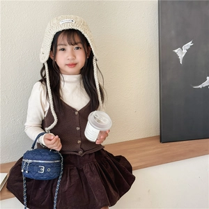 Kids quilted denim chain crossbody bag paired with autumn knitwear and corduroy skirt
