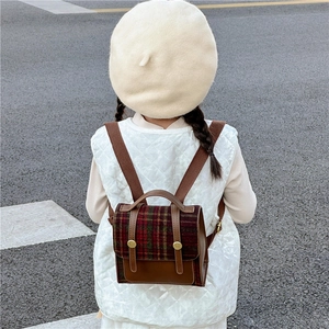 Vintage kids plaid backpack in red and green tartan with brown leather strap detailing
