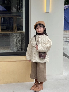 Toddler autumn outfit featuring a heart-quilted jacket and a stylish plaid mini crossbody bag