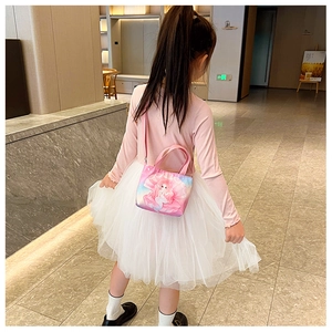 Detailed back view of a pink mermaid print canvas mini tote bag with adjustable strap