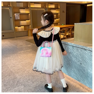 Kids gradient canvas handbag with cartoon print shown on child in indoor setting