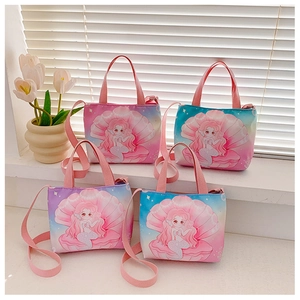 Detail of four colorful gradient cartoon mermaid canvas bags with adjustable straps