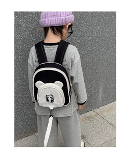 Detail view of cartoon panda toddler backpack with safety leash for child outdoor security