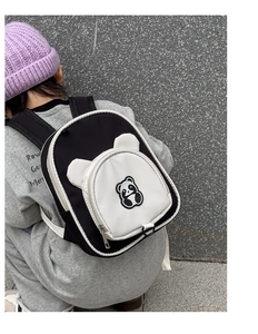Outdoor shot of a cute panda cartoon backpack for kids with decorative 3D ears