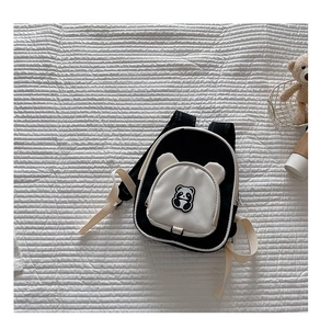 Detail of cute 3D panda design and embroidery on waterproof kids oxford backpack