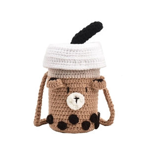 Handmade crochet milk tea cup crossbody bag with cute bear face and pearl details