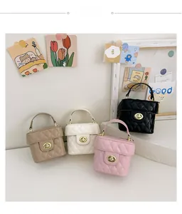 Quilted mini bucket bags for girls in khaki, white, pink and black with gold clasps