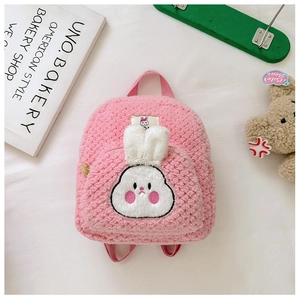 Close-up of pink plush bunny backpack for toddlers with soft lamb wool texture detail