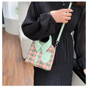 Unique pink and green plaid shirt-style crossbody bag with mint green leather collar detail