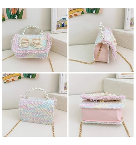Detail views of colorful tweed kids handbag with pearl bow and golden chain strap