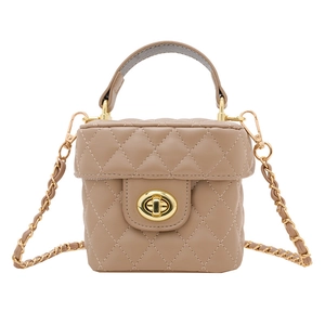Girl's beige quilted bucket box bag with gold chain strap and top handle design