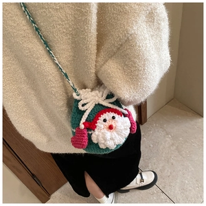 Handmade crochet Santa Claus crossbody bag with green knitted body and 3-color shoulder strap