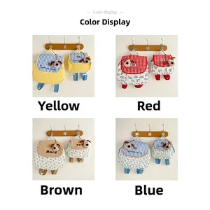 Close-up of quilted children backpacks with cute plush puppy charms in four colors