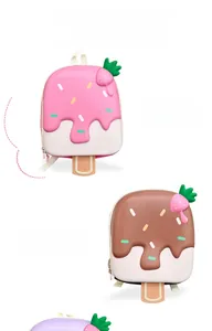 Detail view of pink and brown ice cream shaped hard shell backpacks for toddlers