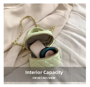 Internal capacity of green quilted crossbody bag showing storage for makeup cushions