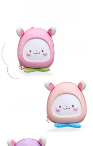 Detail of cartoon egg-shell toddler backpack with bunny ears and inner pocket dividers