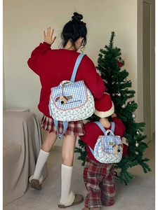 Quilted floral backpacks for parents and children with cute plush dog pendants