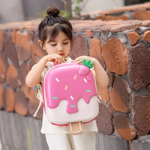 Cute pink ice cream shell backpack for kids with strawberry decor and white straps