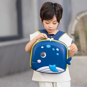 Kids whale shaped hard shell backpack in dark blue with cute fin and water spray detail