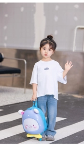 Detail of cute rabbit eggshell backpack for kids with waterproof shell and blue ears