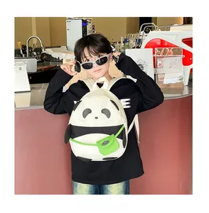 Close-up of cute panda backpack for kids with a neon green mini accessory pouch