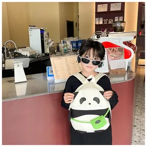 Close-up of cute panda backpack with adjustable straps and small green zipper pouch
