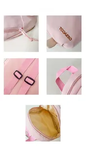 Pink canvas backpack detail showing zipper closure and embroidered brand name