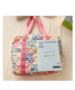 Quilted floral kids tote bag with cute animal patterns and pink canvas handles