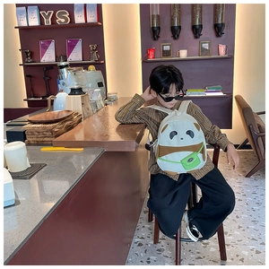 Cute panda-shaped kids backpack for kindergarteners featuring a green mini cross-body bag