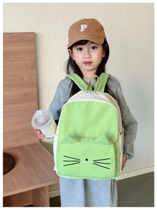 Toddler wearing a lightweight cartoon cat backpack with 3D ears and contrast paneling