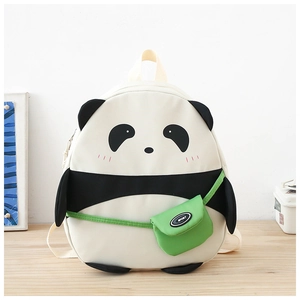 Close-up of cute panda backpack with soft 3D ears and a green mini sport cross bag detail